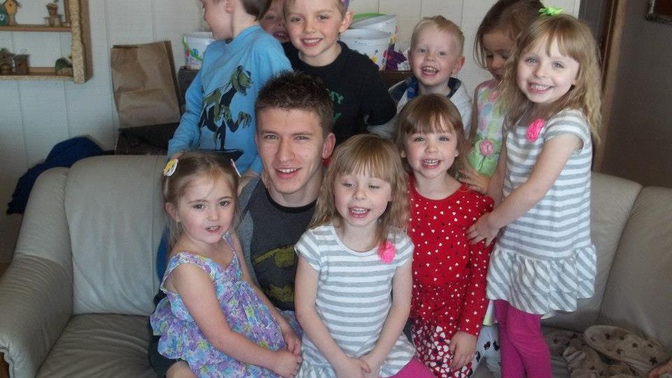 Jacob Werre with kids from his mother's daycare