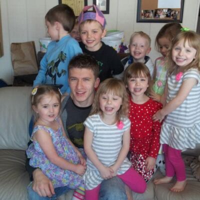 Jacob Werre with kids from his mother's daycare