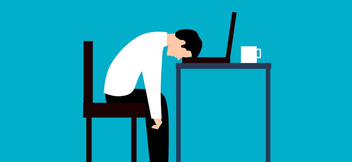 Graphic of a man looking exhausted at his desk