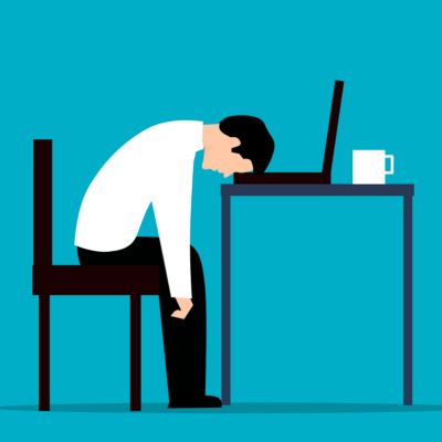 Graphic of a man looking exhausted at his desk