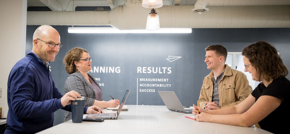 A marketing team meeting together