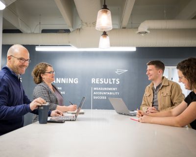 A marketing team meeting together