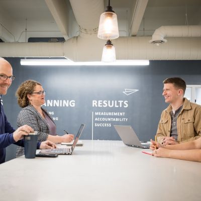 A marketing team meeting together