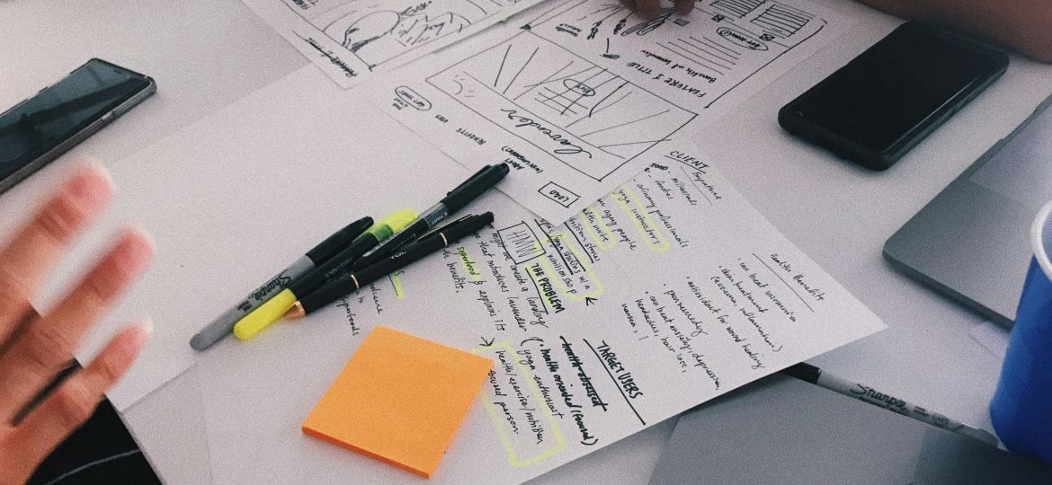 A marketing team brainstorming messaging, targeting, and branding