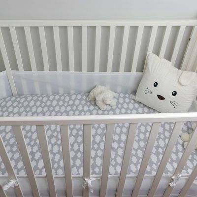 white crib in nursery while preparing for fatherhood